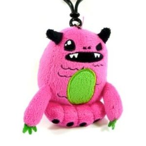 ISO DO NOT BUY SO SO HAPPY TACO MONSTER KEYCHAIN